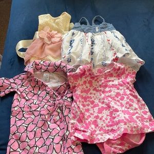 Four 0-3 Month Dresses